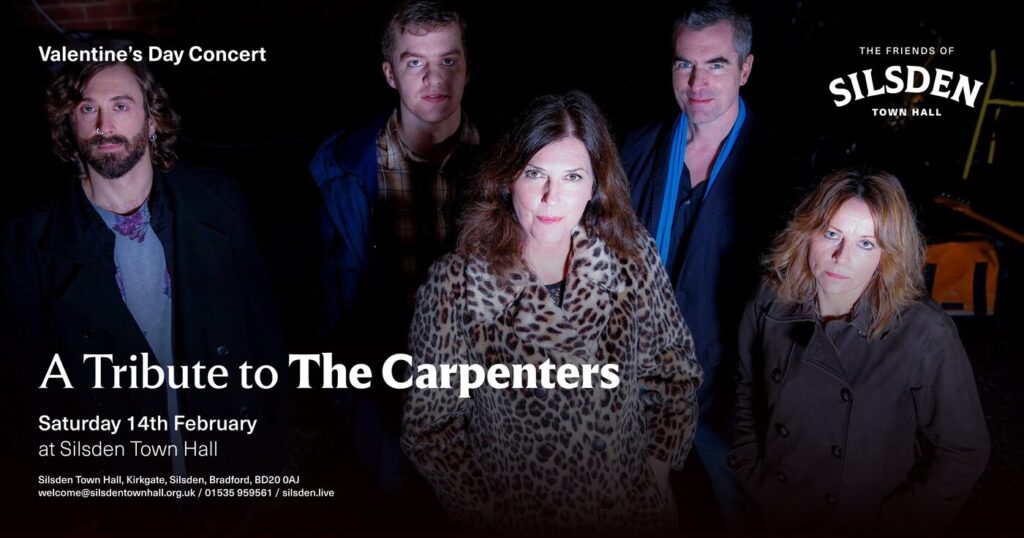 Five musicians in dim lighting, showcasing a tribute to The Carpenters, with three men and two women posing confidently.