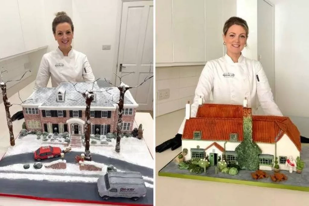 A woman presents two intricately designed cakes resembling iconic houses, one snowy and one with lush greenery.