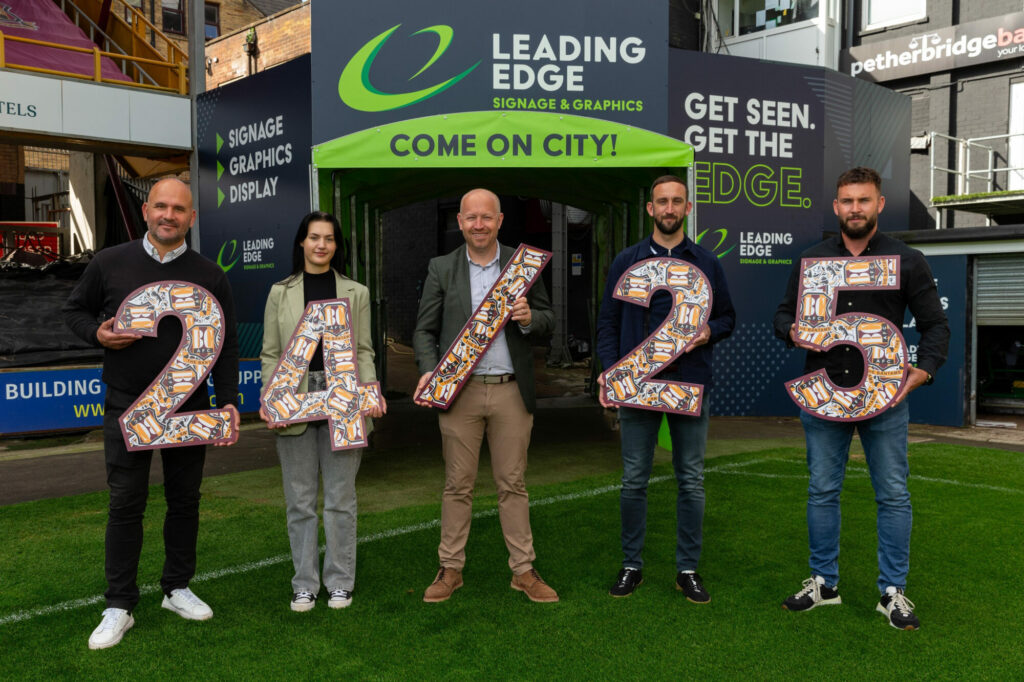 Leading Edge signage team