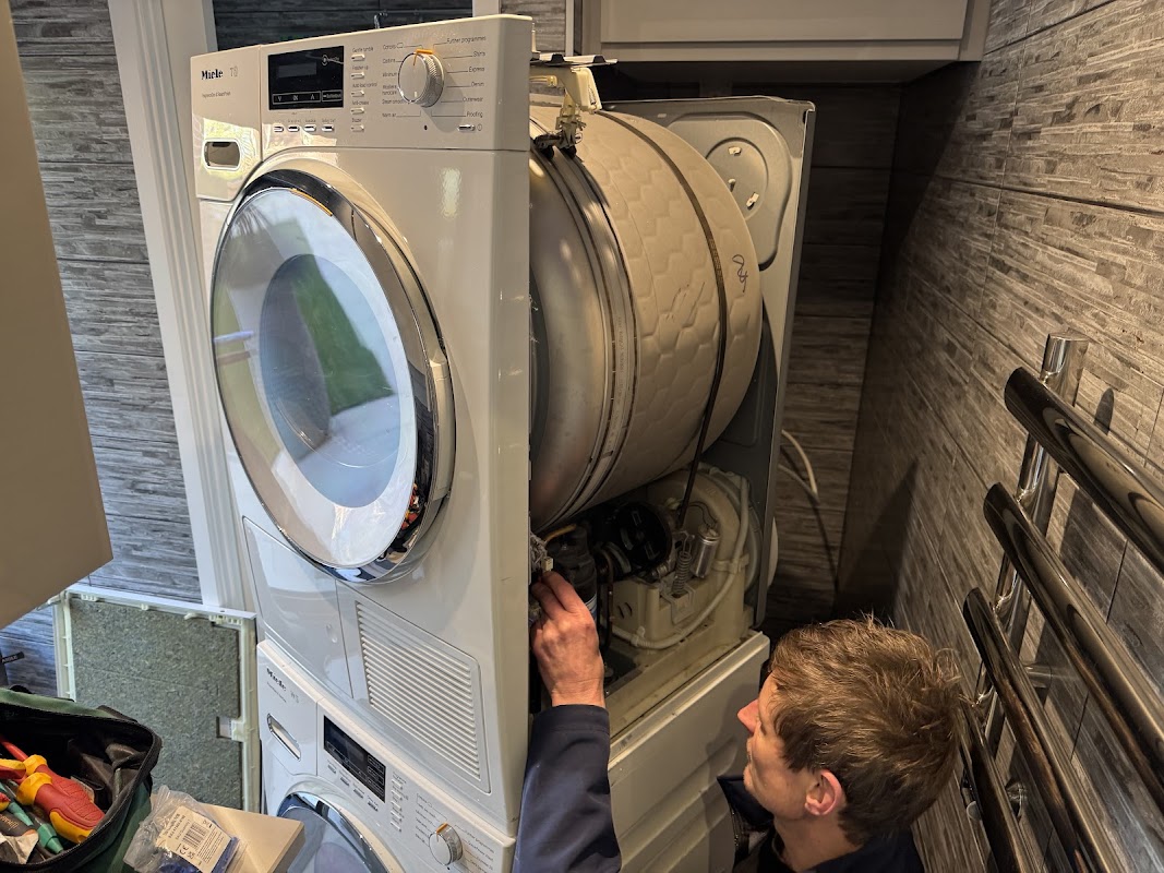 Washing machine belt bearing and drum repair